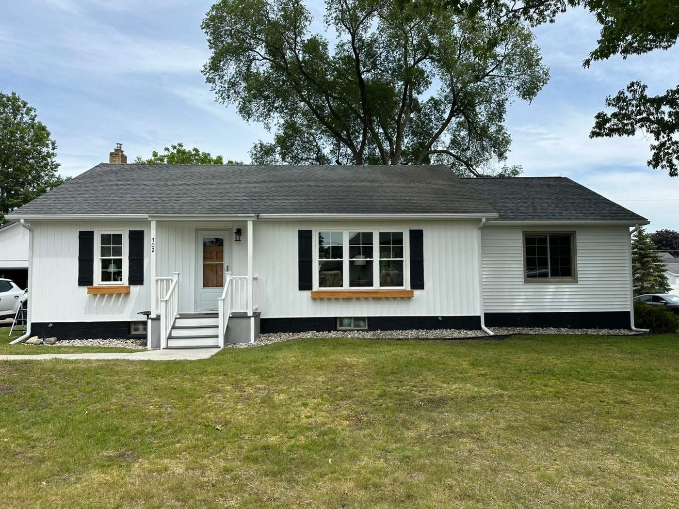 Ranch home with new siding and windows